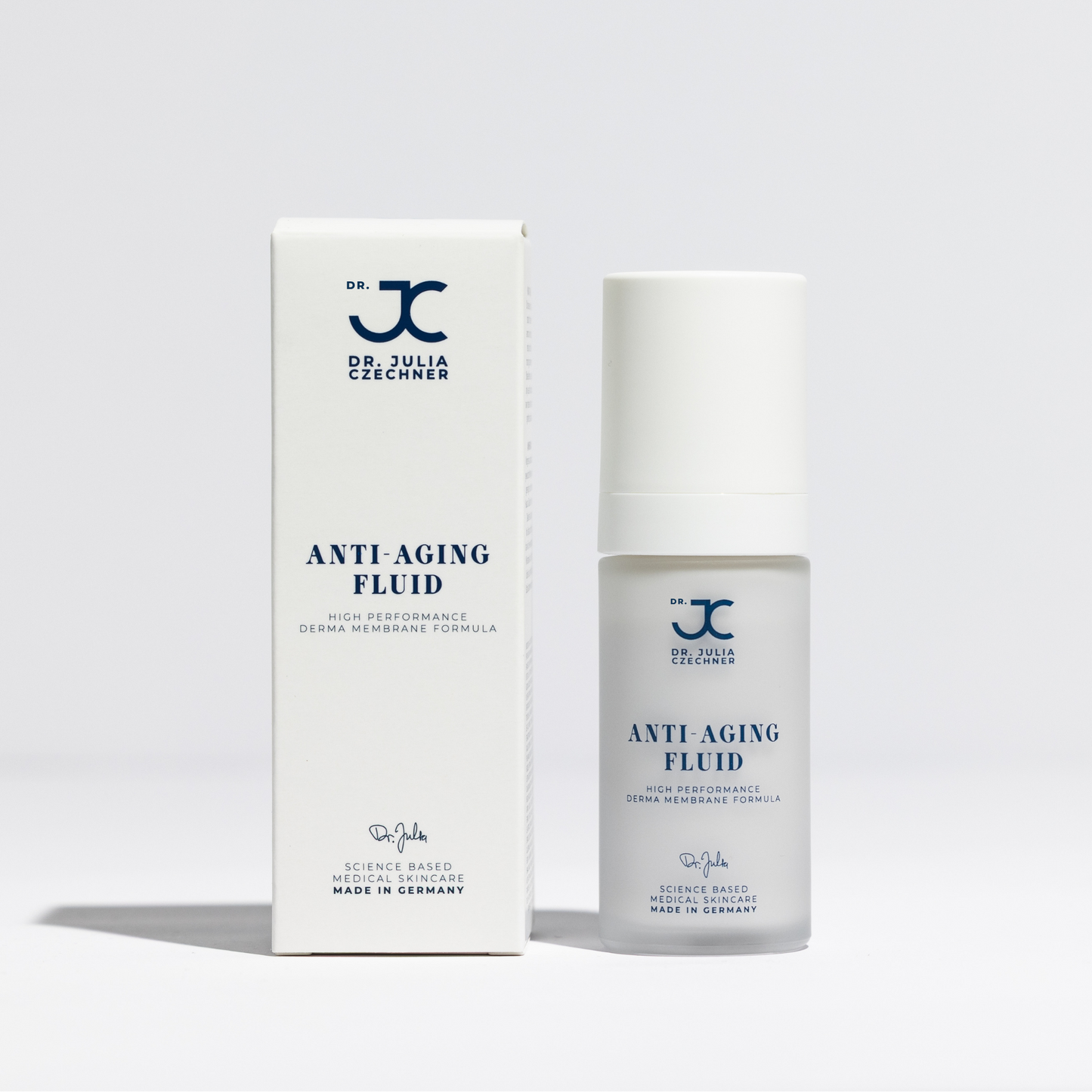 Anti-Aging Fluid For Men neben seiner Umverpackung
